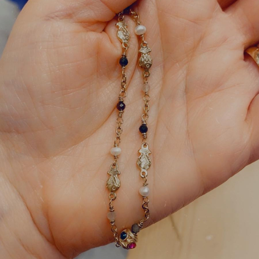 Collana con pietrine colorate in acciaio inossidabile